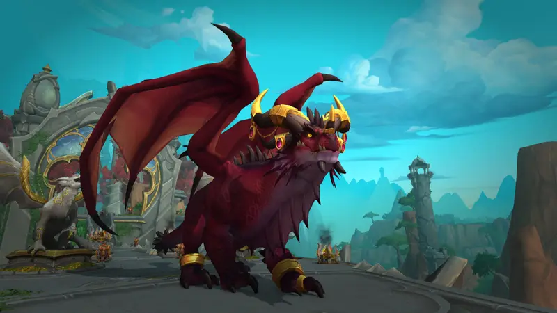 A saddled gryphon stands in front of a tower under a blue sky