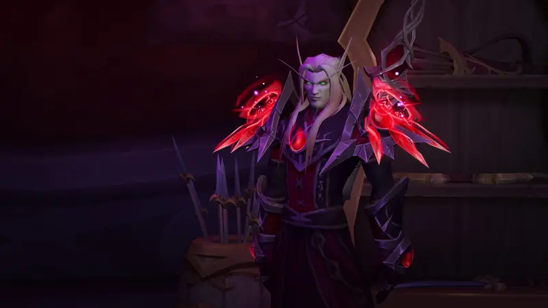 Blood elf with red blades in a dark setting